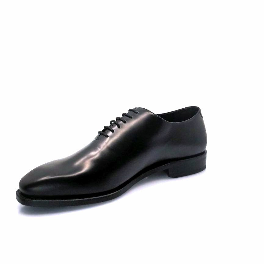 Black whole cut leather shoe for the right side 