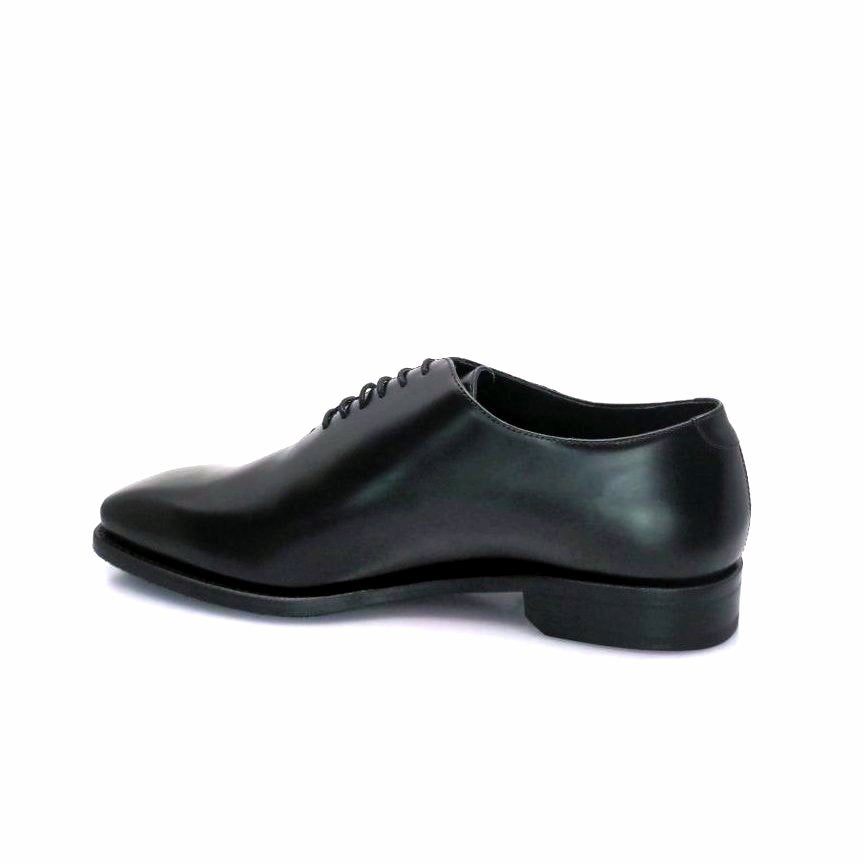 Black whole cut leather shoe for the rubber toe sole