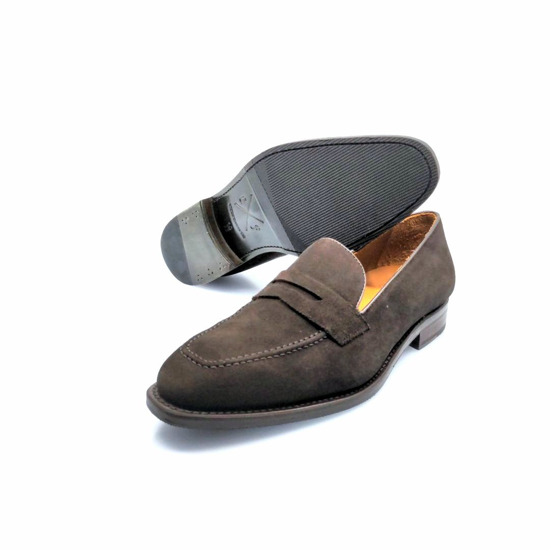 brown suede loafer with golden inner parts for black sole